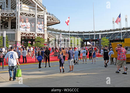 Fans make their way to Progressive Field in Cleveland, Ohio, USA for the 2019 Major League Baseball All Star Game. Stock Photo