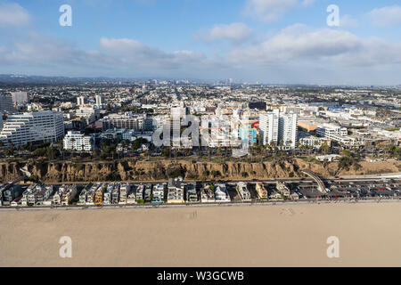Aerial view of broad sandy beach, eclectic housing and urban buildings in Santa Monica and Los Angeles, California. Stock Photo