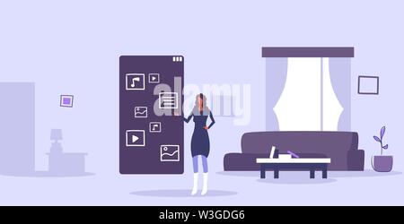 woman using touchscreen smartphone with application icons mobile apps user interface concept modern living room interior horizontal full length Stock Vector