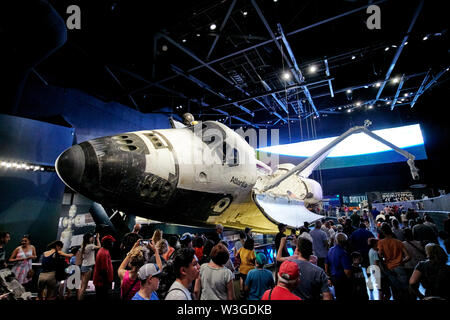 tourists visiting the Space Shuttle Atlantis at Kennedy Space Center Florida USA Stock Photo