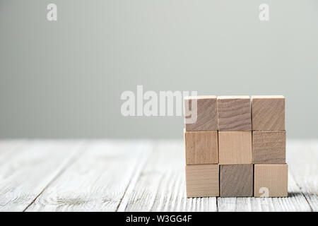 Nine wooden blocks arranged in cube Stock Photo