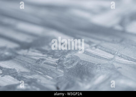 silver color painted bacground texture selective focus Stock Photo