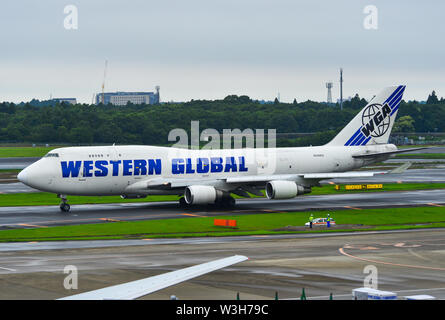 Tokyo, Japan - Jul 4, 2019. N344KD Western Global Airlines Boeing 747-400F taxiing on runway of Tokyo Narita Airport (NRT). Stock Photo