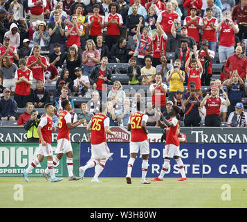 Commerce City, Colorado, USA. 15th July, 2019. Arsenal F ALEX IWOBI, far right, welcomes his team mates for a celebration after scoring Arsenal's 1st. goal of the game during the 1st. Half at Dicks Sporting Goods Park in Commerce City Monday night. Arsenal beats the Rapids 3-0. Credit: Hector Acevedo/ZUMA Wire/Alamy Live News Stock Photo