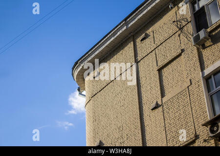 The wall of the house that was built in the late nineteenth century. Art Nouveau style. Site about building, architecture, history. Stock Photo