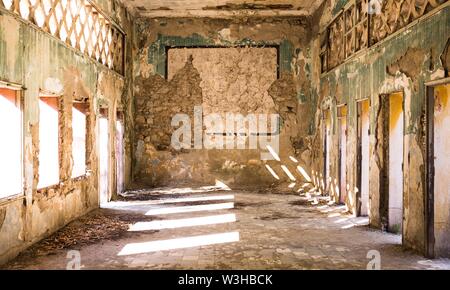 Wide shot of interior an old abandoned destroyed building in a suburban city Stock Photo