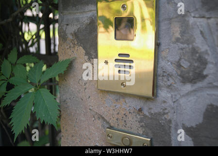 Closeup of the intercom mounted on the building wall, concept  of security Stock Photo