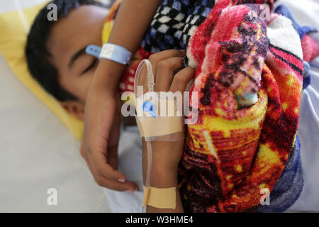 Manila, Philippines. 16th July, 2019. A patient rests inside a dengue ward of the San Lazaro Hospital in Manila, the Philippines, July 16, 2019. The Philippines declared a 'national dengue alert' on Monday in several regions of the Philippines due to 'the rapidly increasing number of cases.' From January 1 to June 29, 2019, the Philippine Department of Health (DOH) said 106,630 dengue cases have been reported nationwide, an 85 percent increase from the 57,564 cases reported over the same period last year, and at least 450 deaths were recorded. Credit: Rouelle Umali/Xinhua/Alamy Live News Stock Photo