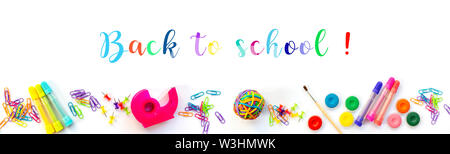 Panorama of colorful school supplies  isolated on white background with text. Back to school web banner. Stock Photo