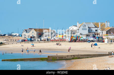 Lyme Regis, Dorset, UK. 16th July, 2019. UK Weather: Glorious hot sunshine and blue skies at the seaside resort of Lyme Regis. The Mediterranean heatwave is set to continue until Friday. Credit: Celia McMahon/Alamy Live News Stock Photo