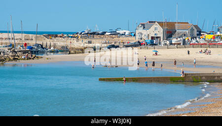 Lyme Regis, Dorset, UK. 16th July, 2019. UK Weather: Glorious hot sunshine and blue skies at the seaside resort of Lyme Regis. The Mediterranean heatwave is set to continue until Friday. Credit: Celia McMahon/Alamy Live News Stock Photo