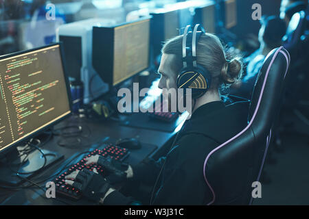 Gaming addiction. Man bearded hipster gamer headphones and keyboard. Play  computer games. Online gaming platform. Gaming modern leisure. Cyber sport  arena. Gaming PC build guide. Graphics settings Stock Photo by ©stetsik  510565044