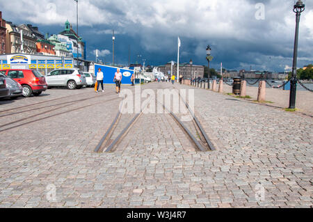 STOKHOLM, SWEDEN - SEP 2009: Old tram tracks to nowhere on the Stockholm waterfront in Gamla Stan. Stock Photo