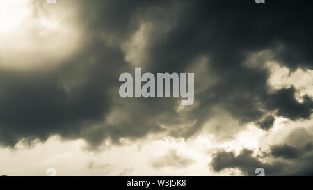 The dark clouds. The sky in black. Pattern of the clouds of tornado, Hurricane or thunderstorm. Sometimes heavy clouds but no rain Stock Photo