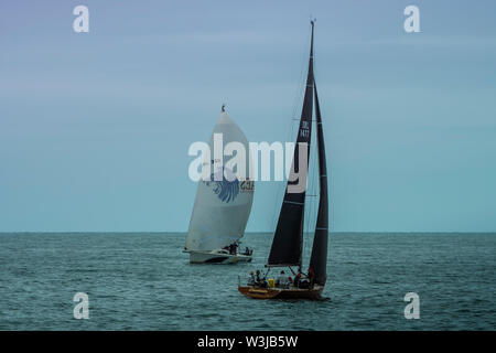 Meeting in the sea. Two sailing boats racing against each other Stock Photo