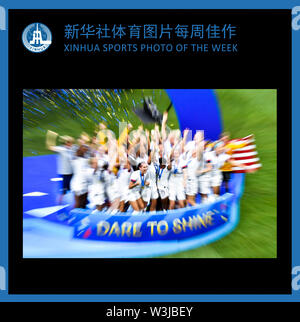 Beijing, France. 7th July, 2019. XINHUA SPORTS PHOTO OF THE WEEK (from July 8 to July 14, 2019) TRANSMITTED on July 16, 2019. Players of the United States celebrate during the awarding ceremony of the 2019 FIFA Women's World Cup at Stade de Lyon in Lyon, France, July 7, 2019. Credit: Chen Yichen/Xinhua/Alamy Live News Stock Photo