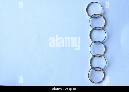 Stainless steel loop for hanging on the white background Stock Photo