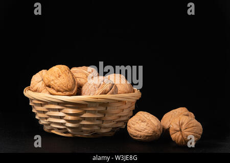 Delicious walnuts on black background Stock Photo