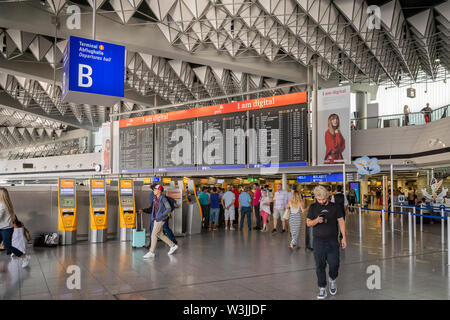 Frankfurt, Germany - July 2019: Frankfurt Airport architecture in terminal with flight information. Frankfurt am Main Airport is a major airport in EU Stock Photo