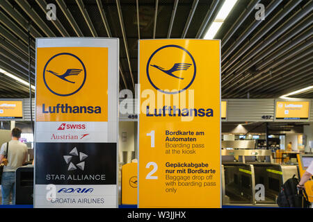 Frankfurt, Germany - July 2019: Lufthansa airline check-in counter in Frankfurt International Airport. Lufthansa is the largest airline in EU Stock Photo