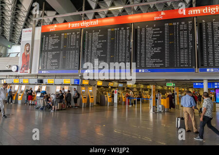 Frankfurt, Germany - July 2019: Frankfurt Airport architecture in terminal with flight information. Frankfurt am Main Airport is a major airport in EU Stock Photo