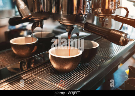 The process of preparing espresso in a professional coffee machine