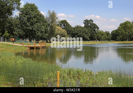 The new wild swimming lake in the restored grounds of Beckenham Place Park, London, UK, shown the week before its opening on July 20th 2019 Stock Photo