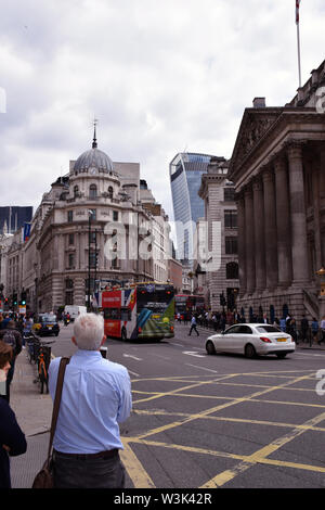 Old and new in the City of London UK July 2019. 20 Fenchurch Street in the background, Royal Exchange in the foreground Stock Photo