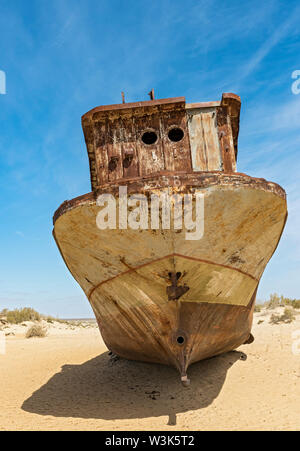 Rusting ship in the former port in Moynaq (Moynak), Uzbekistan Stock Photo