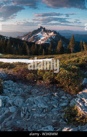 Rocky mountains covered with the last snow near Mount Shasta volcano. Castle dome from Castle Crags State Park, Castle Crags Wilderness California USA Stock Photo