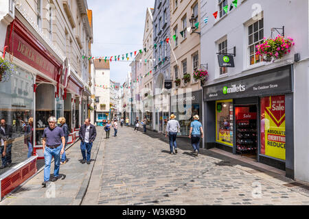 People shopping in The Pollett, St Peter Port, Guernsey, Channel Islands UK Stock Photo