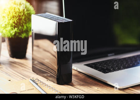 external hard drive on desk Stock Photo