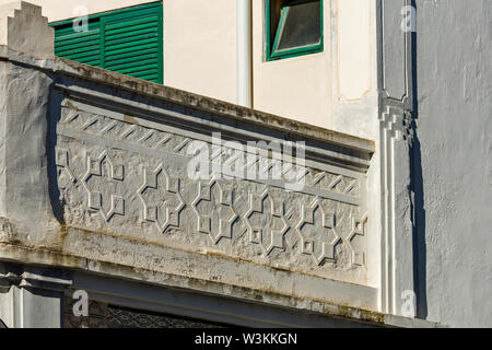details of a frieze on an old house in the city of Olhao, Algarve, Portugal Stock Photo