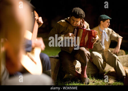 View of a man playing a musical instrument. Stock Photo