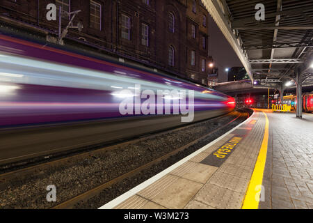 First Great Western railway Intercity 125 (high speed train) departing from  London Paddington  with motion blur