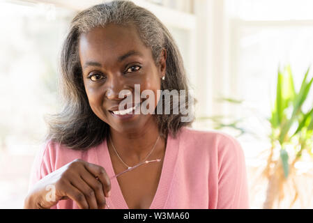 Smiling mature woman Stock Photo