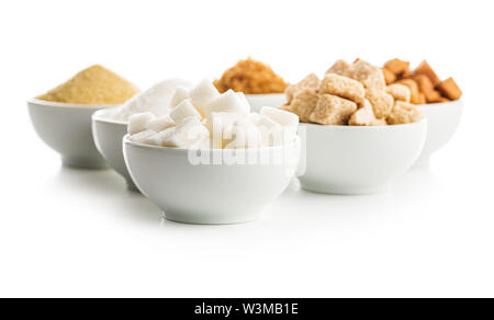 Brown and white sugar in bowls isolated on white background. Stock Photo