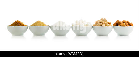 Brown and white sugar in bowls isolated on white background. Stock Photo