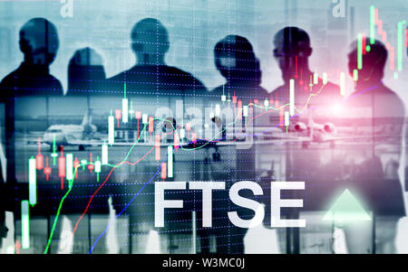 FTSE 100 Financial Times Stock Exchange Index United Kingdom UK England Investment Trading concept with chart and graphs. Stock Photo