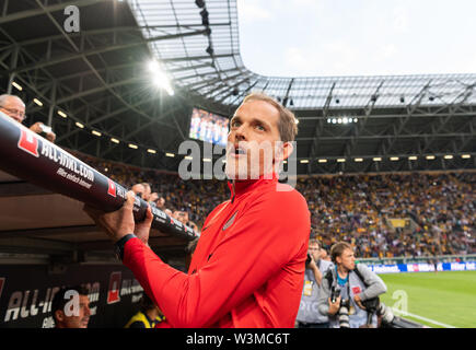 16 July 2019, Saxony, Dresden: Football, test match, SG Dynamo Dresden - Paris Saint-Germain, in the Rudolf-Harbig-Stadium. Paris coach Thomas Tuchel is at the coach's bench. Photo: Robert Michael/dpa-Zentralbild/dpa Stock Photo