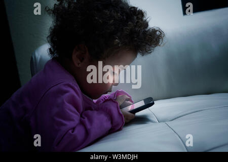 Girl using smart phone Stock Photo