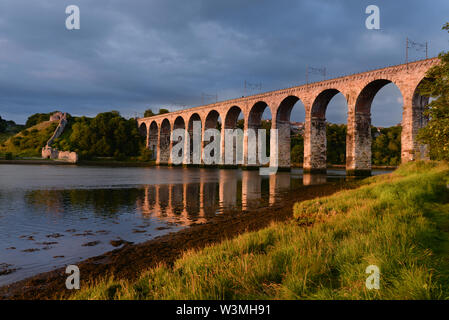 The Royal Border Bridge opened in 1850 by Queen Victoria carries the east coast railway across the River Tweed at Berwick upon Tweed Stock Photo