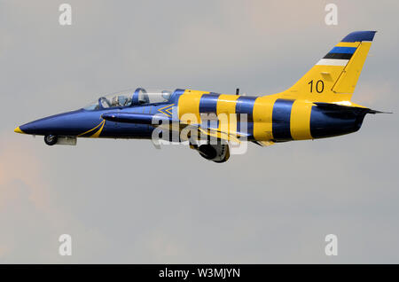 Baltic Bees Jet Team flying in clouds with smoke on at Radom Airshow ...