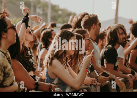 MADRID - JUN 30: The crowd in a concert at Download (heavy metal music festival) on June 30, 2019 in Madrid, Spain. Stock Photo