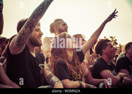 MADRID - JUN 30: The crowd in a concert at Download (heavy metal music festival) on June 30, 2019 in Madrid, Spain. Stock Photo