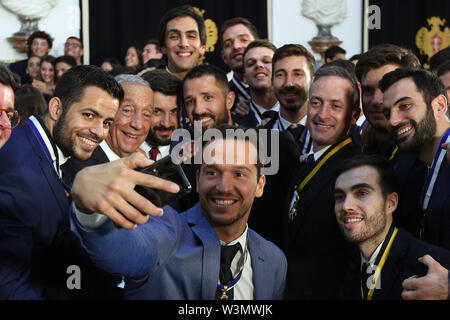 (190717) -- LISBON, July 17, 2019 (Xinhua) -- Portuguese President Marcelo Rebelo de Sousa (2nd L) takes a selfie with Portugal's national Roller Hockey team during the awarding ceremony for the Portugal's national Roller Hockey team at the Belem Palace in Lisbon, Portugal, on July 16, 2019. Portugal's national Roller Hockey team claimed the title of the Rink Hockey World Championship Senior Men at the 2019 World Rolle Games in Barcelona, Spain on July 15, 2019. (Xinhua/Pedro Fiuza) Stock Photo