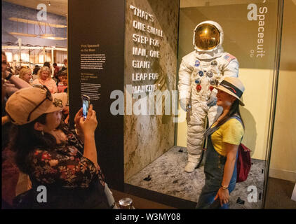 Visitors flock to see the newly restored spacesuit worn by Astronaut Neil Armstrong when he first walked on the Moon fifty years ago, July 20, 1969. Stock Photo