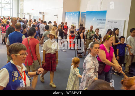 Visitors flock to see the newly restored spacesuit worn by Astronaut Neil Armstrong when he first walked on the Moon fifty years ago, July 20, 1969. Stock Photo