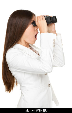 Side view of surprised young businesswoman looking through binoculars isolated over white background Stock Photo