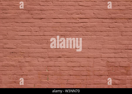 Very old brick wall texture background heavily painted in red brown color Stock Photo